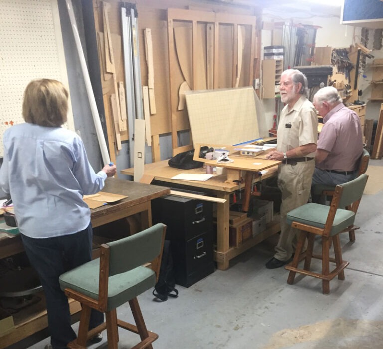 Members work together in a private workshop